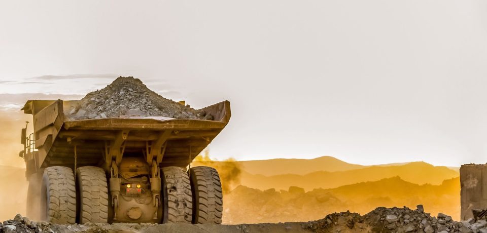 A dump truck for transporting rocks at a platinum mining and processing sit